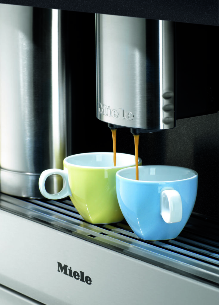 De uitloop van mijn Miele koffiemachine is verstopt, hoe los ik dit op? Miele